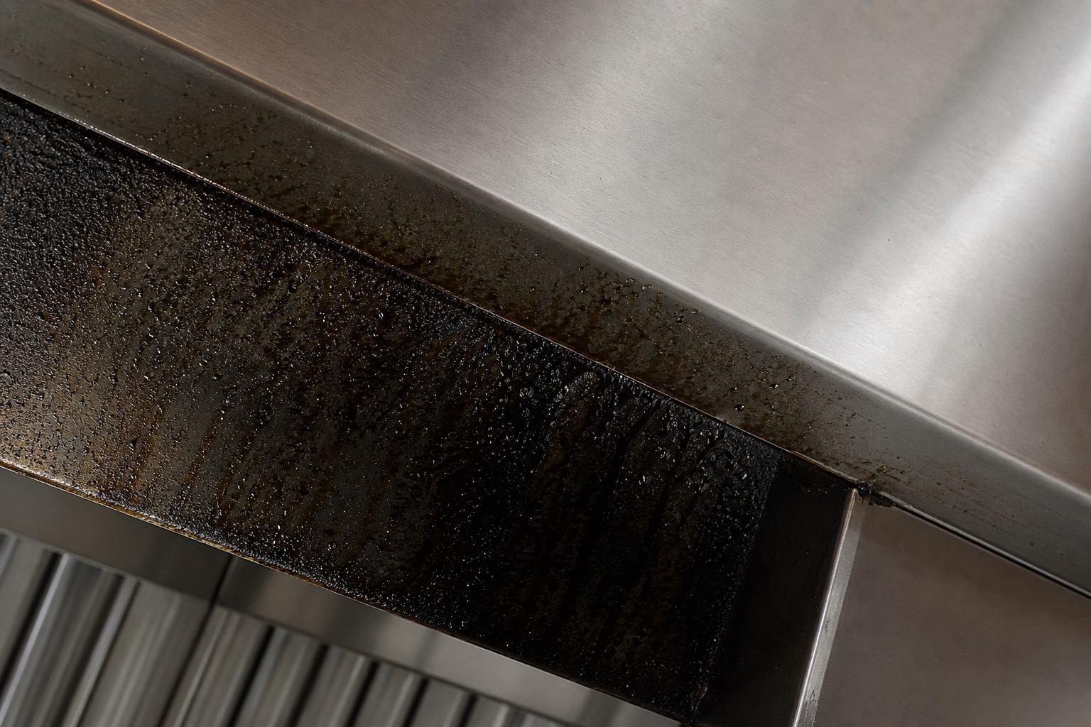 Fire risk in greasy kitchen extract systems