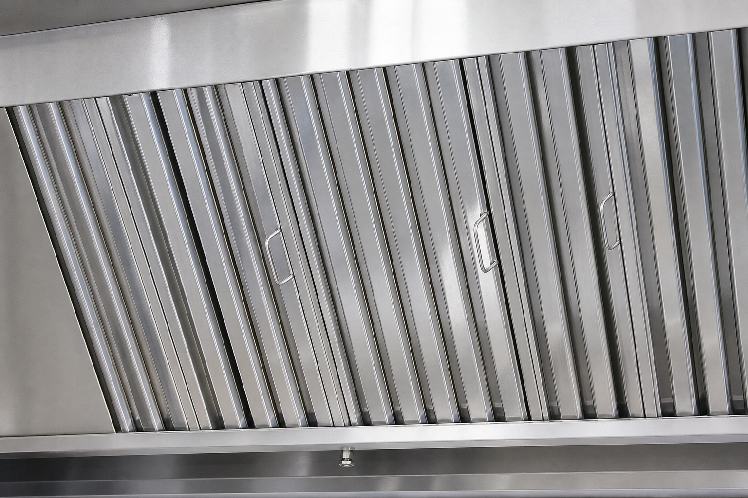 Detail of cleaned stainless canopy and grease filters